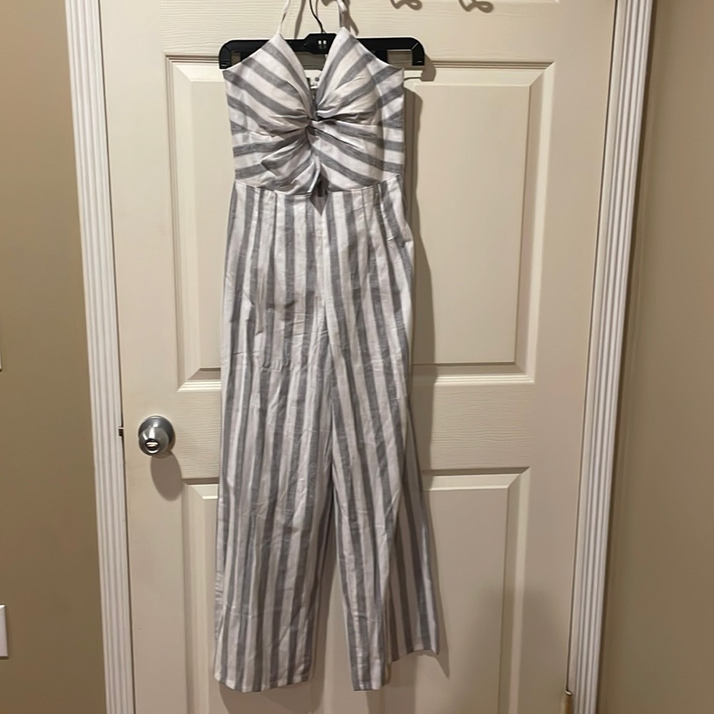 Derek heart halter top jumpsuit. Grey and white stripes. Brand new. Size Small.